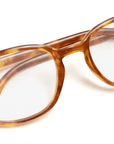 Quincy Blue Light Blockers in honey tortoise, overhead view