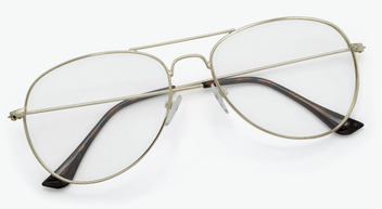 Gold-framed eyeglasses on a white background
