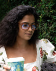 Quincy Blue Light Blockers in honey tortoise, lifestyle photo 